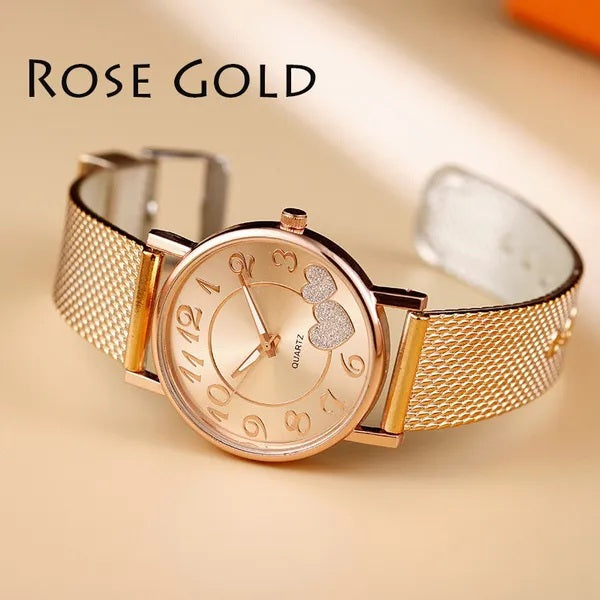 Schöne Damenuhr mit Doppelherz Motiv